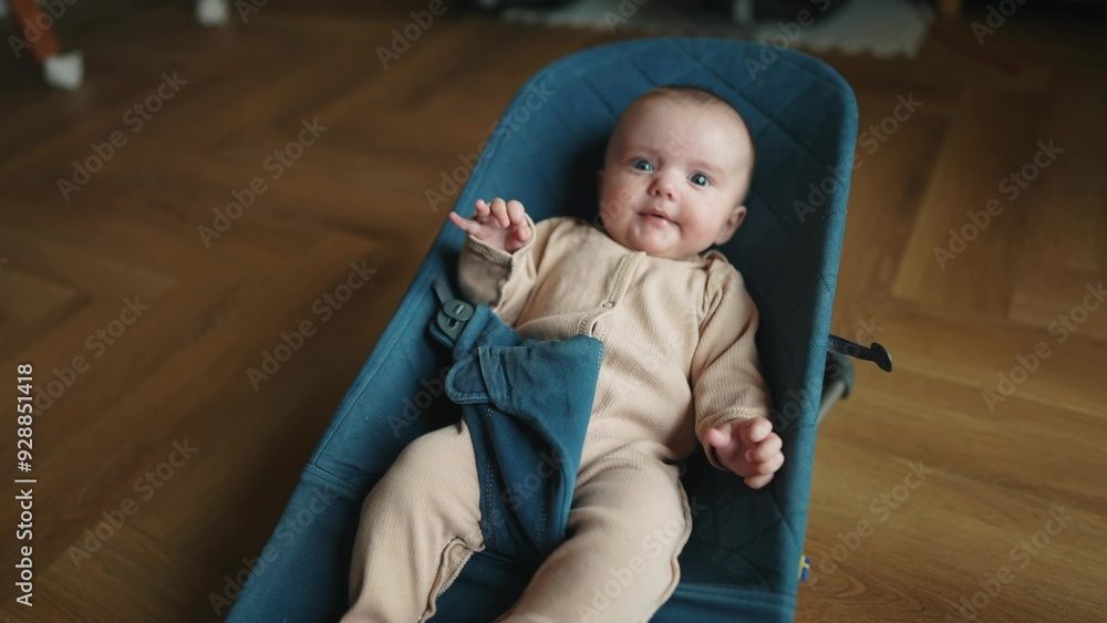 newborn baby in a rocking chair. happy family kid dream concept. portrait newborn baby boy child. son boy baby lies in a rocking chair at home lifestyle in a room indoors newborn baby in a rocking chair. happy family kid dream concept. portrait newborn baby boy child. son boy baby lies in a rocking chair at home lifestyle in a room indoors