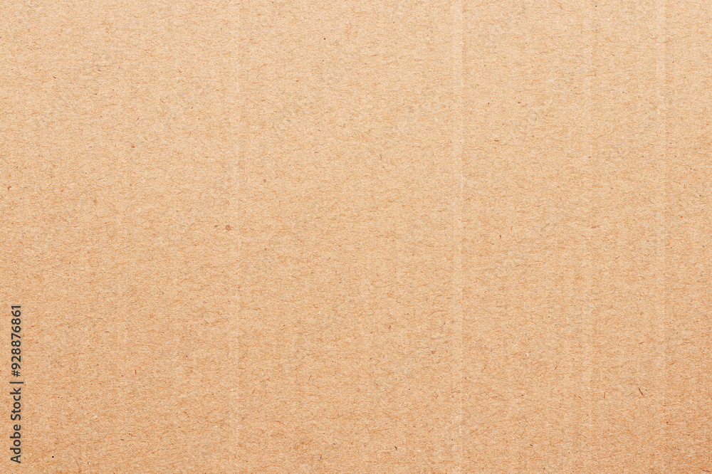 Fototapeta premium Brown cardboard sheet abstract background, texture of recycle paper box in old vintage pattern for design art work.