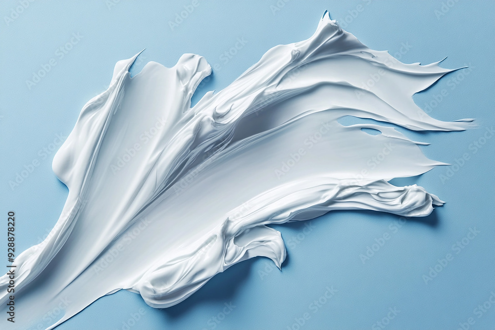 Cosmetic smears of cream presented on a blue background Cosmetic smears of cream presented on a blue background