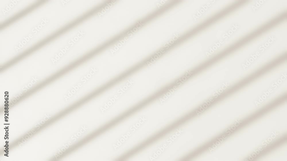 The light from the window blinds on the wall, the shadow lines from the curtain, blurry shadows and silhouettes.. Mockup, copy space for text The light from the window blinds on the wall, the shadow lines from the curtain, blurry shadows and silhouettes.. Mockup, copy space for text