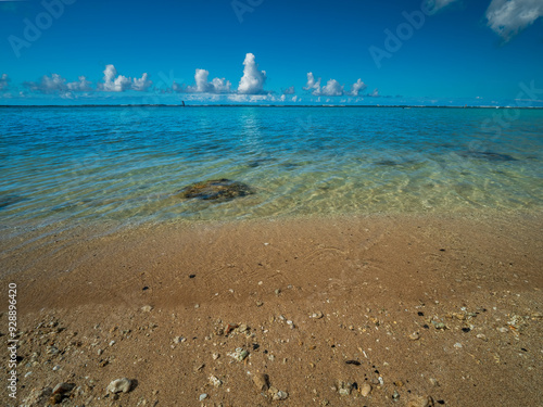 A view at the Oahu Beach with a calm sea photo