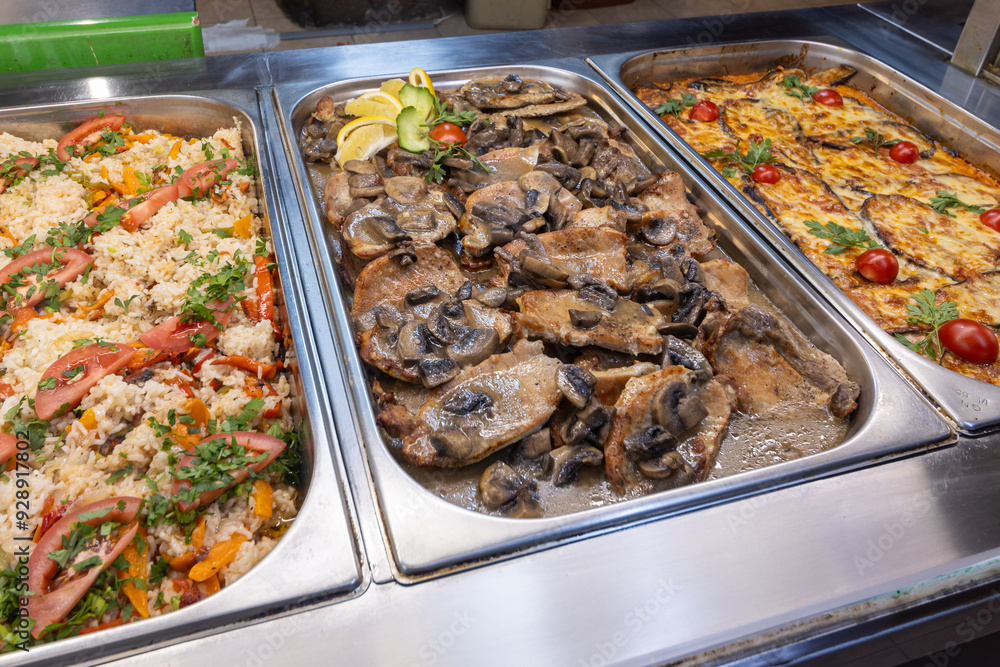 Take-out food in showcase window. Food for home. Take-out food in showcase window. Food for home.