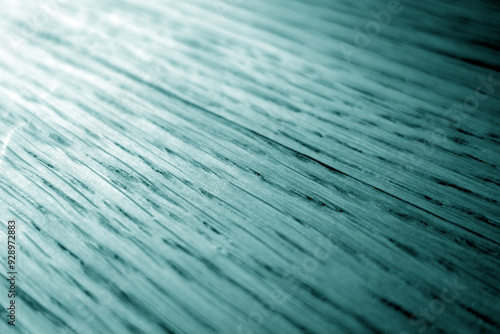 Oak wood texture with blur effect close up in cyan tone