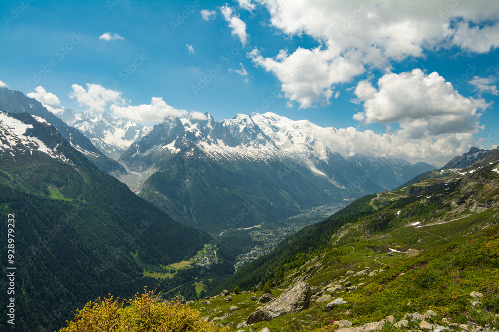 Obraz premium Picturesque panoramic view of the snowy Alps mountains and meadows while hiking Tour du Mont Blanc. Popular hiking route. Alps, Chamonix-Mont-Blanc region, France, Europe.