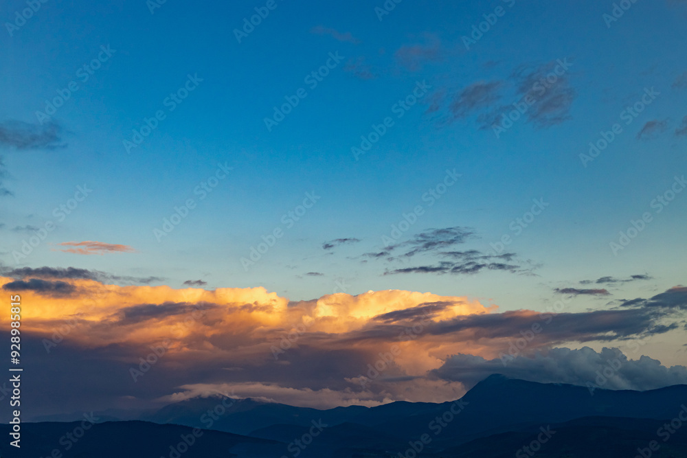 Fototapeta premium Beautiful landscape with clouds in the mountains at sunrise.