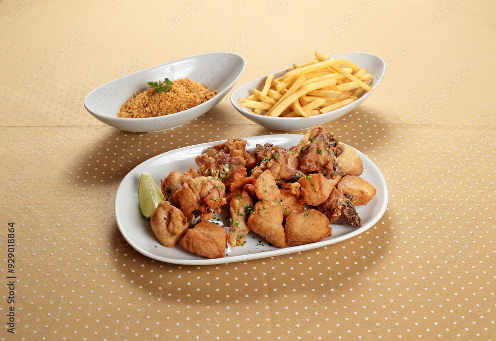 Chicken a little bird with Aglio e Olio with fries and fried garlic Chicken a little bird with Aglio e Olio with fries and fried garlic