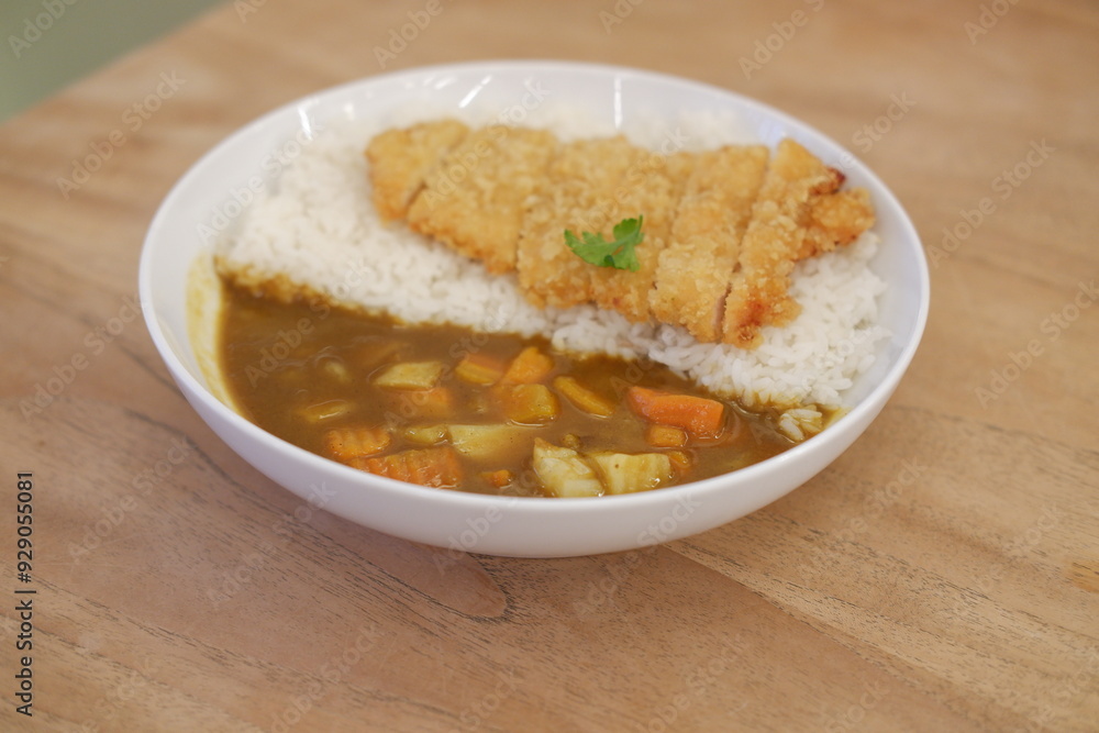 Katsu Curry with Rice with wooden table Katsu Curry with Rice with wooden table