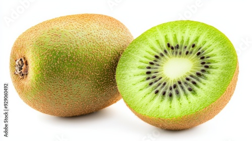 A ripe kiwifruit, whole and cut in half to show its vibrant green flesh and seeds, isolated on white