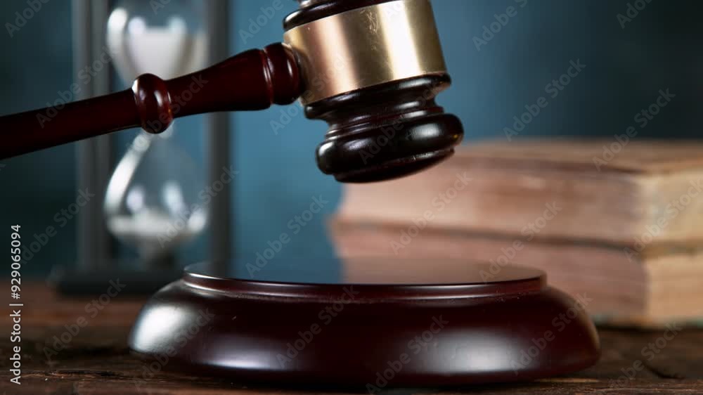 Super slow motion of gavel being struck to decide an auction or guilty verdict in court . Filmed on high speed cinematic camera at 1000 fps Super slow motion of gavel being struck to decide an auction or guilty verdict in court . Filmed on high speed cinematic camera at 1000 fps