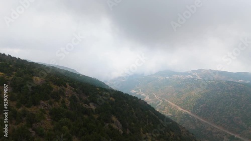 Wallpaper Mural Stunning 4K drone footage of the Sarawat Mountains in Baha, Saudi Arabia. Capture the dramatic contrast of verdant peaks against a backdrop of swirling clouds. Ideal for travel, nature, and cinematic  Torontodigital.ca