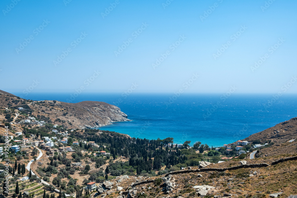Fototapeta premium Gialia Beach in Andros island, Greece. Clear sea water and blue sky, view from above.