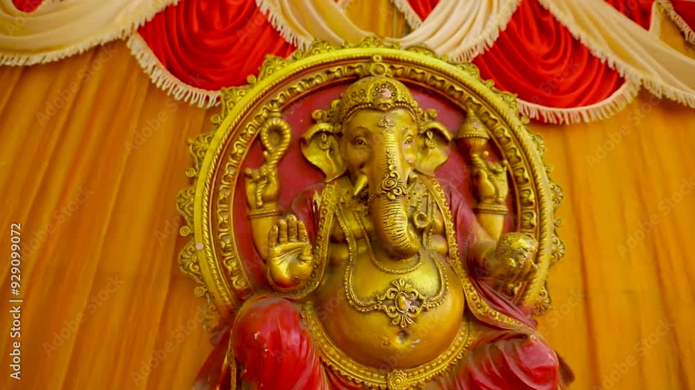 A old stone golden statue of Ganesha A old stone golden statue of Ganesha