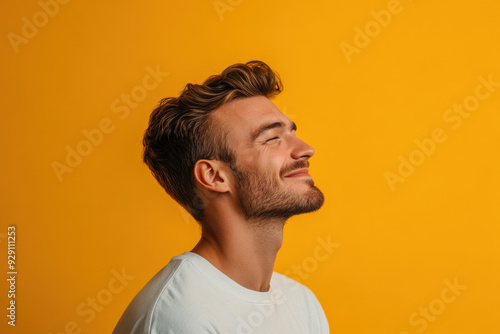 A close up of a man's face with his eyes closed