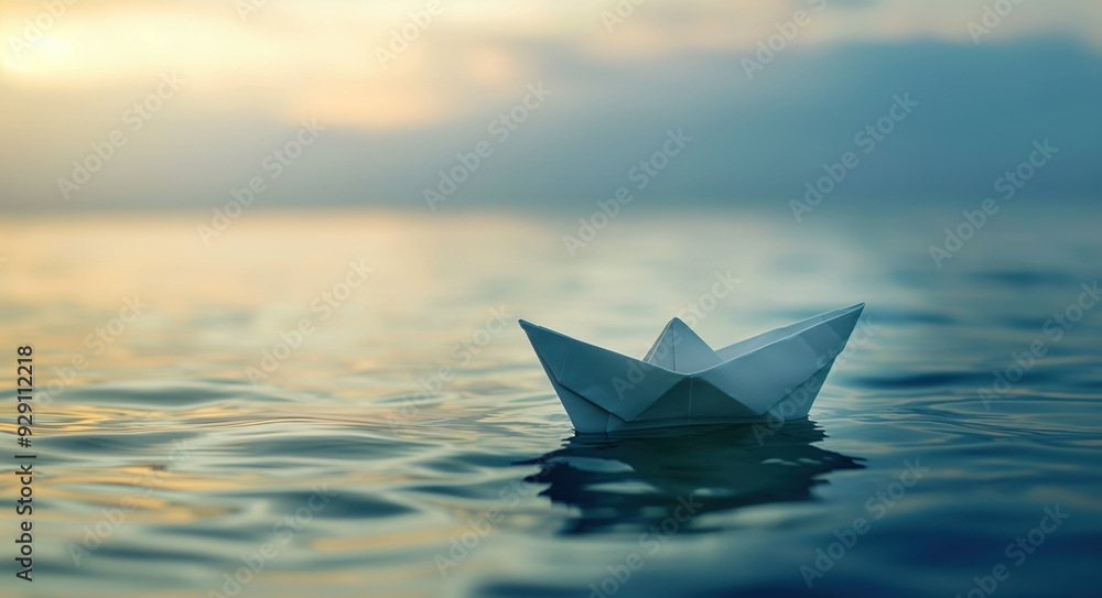 A paper boat sits in the water, surrounded by the calm blue ocean. Concept of tranquility and peacefulness, as the boat floats gently on the water's surface A paper boat sits in the water, surrounded by the calm blue ocean. Concept of tranquility and peacefulness, as the boat floats gently on the water's surface
