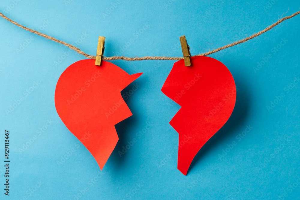 Minimal abstract lost love and breakup concept. Red broken heart
