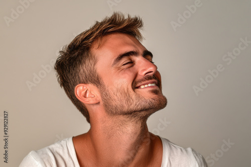 A close up of a man's face with his eyes closed