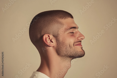 A close up of a man's face with his eyes closed