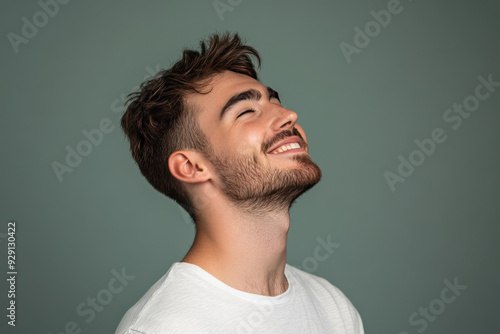 A close up of a man's face with his eyes closed