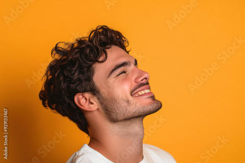 A close up of a man's face with his eyes closed