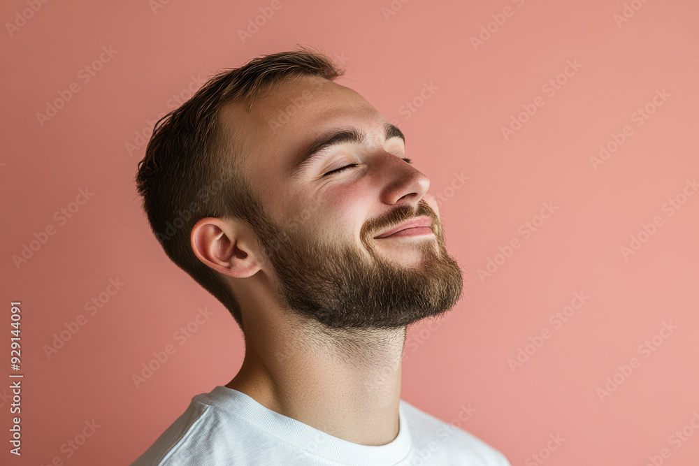 Obraz premium A close up of a man's face with his eyes closed