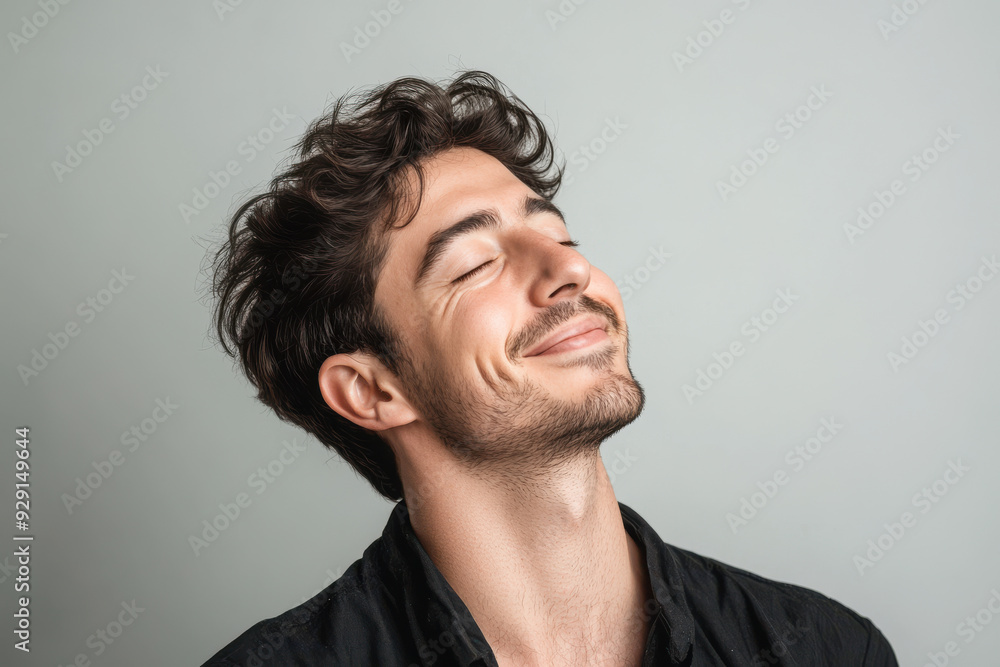 A close up of a man's face with his eyes closed A close up of a man's face with his eyes closed