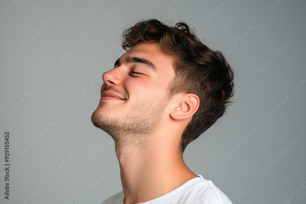 Fototapeta premium A close up of a man's face with his eyes closed