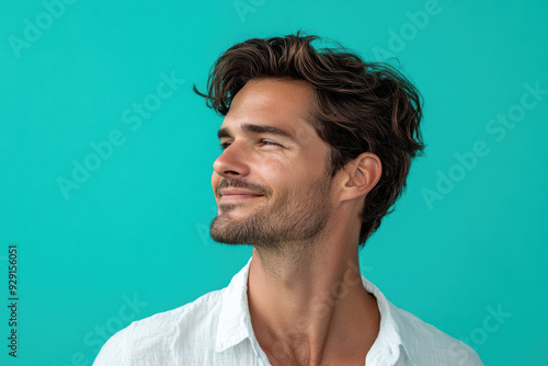 A close up of a man's face with his eyes closed