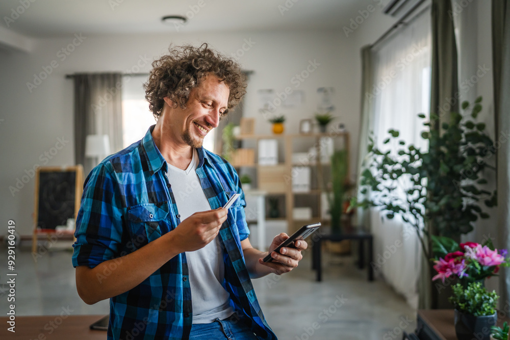 adult man have online shopping on mobile phone with credit card adult man have online shopping on mobile phone with credit card