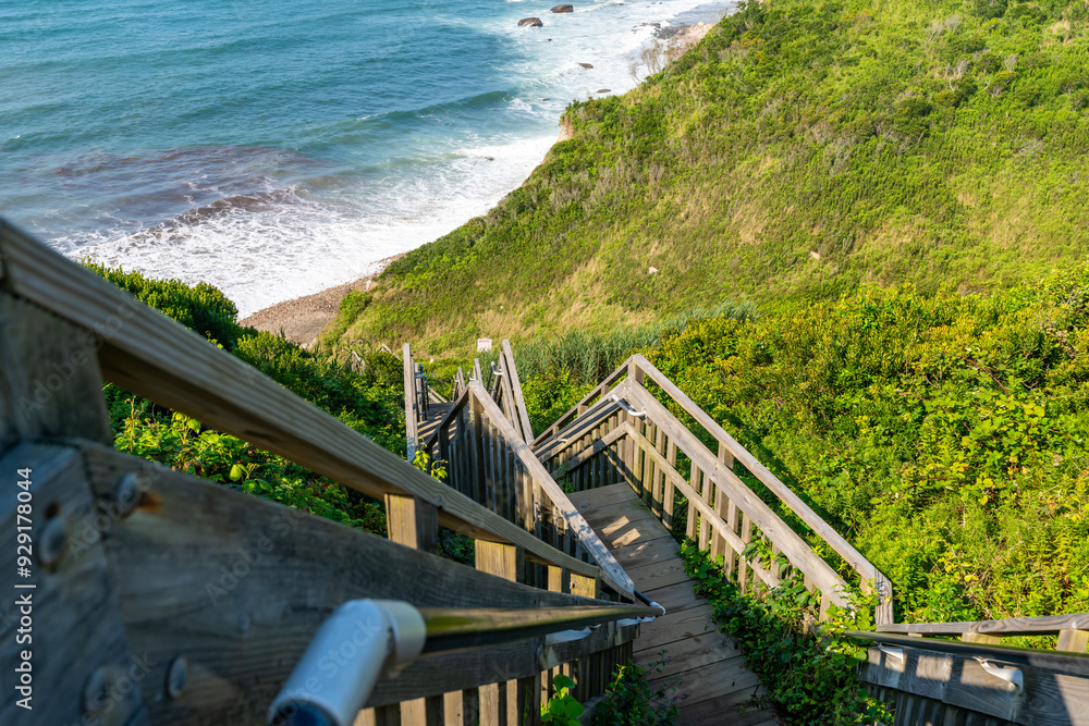 Wooden staircase leading down to the beach at Mohegan Bluffs, Block Island, Rhode Island, USA. August 2024.
Wooden staircase leading down to the beach at Mohegan Bluffs, Block Island, Rhode Island, USA. August 2024.