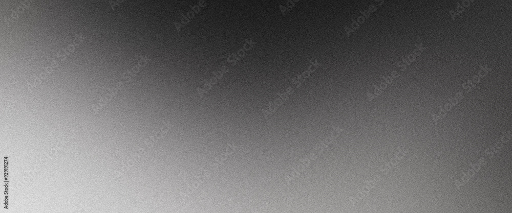 Grainy texture is fading from white to black, creating a gradient background Grainy texture is fading from white to black, creating a gradient background