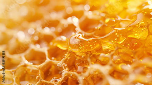 Close-Up of Glowing Honeycomb with Dripping Golden Honey