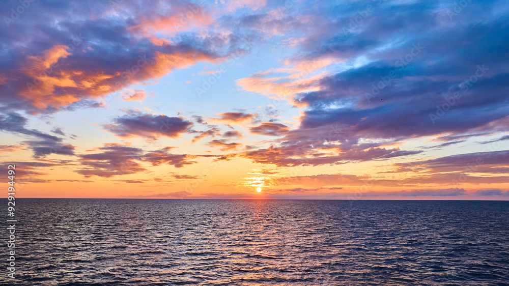 Fototapeta premium Aerial Sunset Over Lake Michigan Golden Hour Tranquility