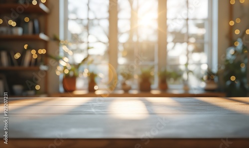 Sunlit wooden table in a cozy room with large windows, houseplants on the sill, and a warm, inviting ambiance. Perfect for interiors and decor themes.