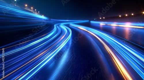 A dynamic scene of illuminated light trails on a dark road, conveying motion and speed.