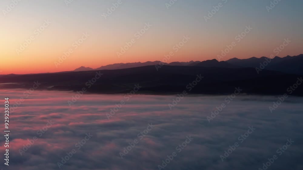 Mountain range with clouds at sunrise Mountain range with clouds at sunrise