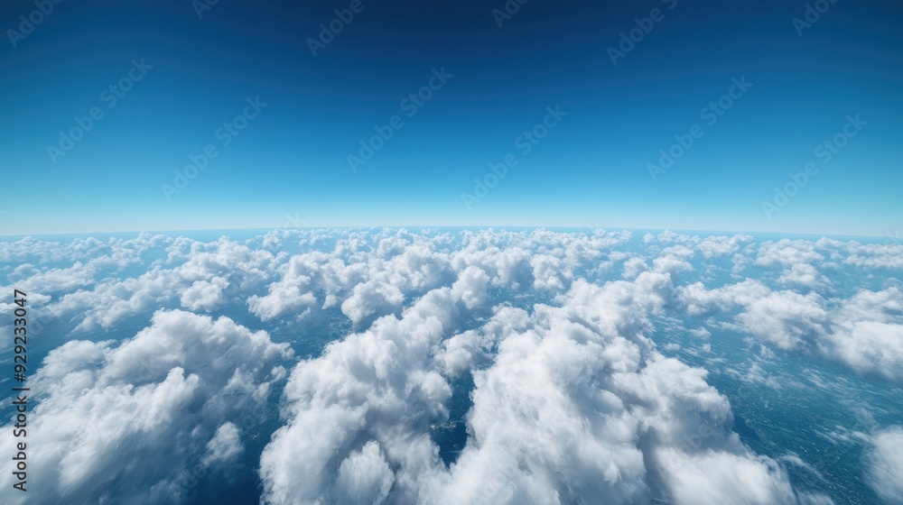 Aerial view of fluffy white clouds over a blue ocean Aerial view of fluffy white clouds over a blue ocean