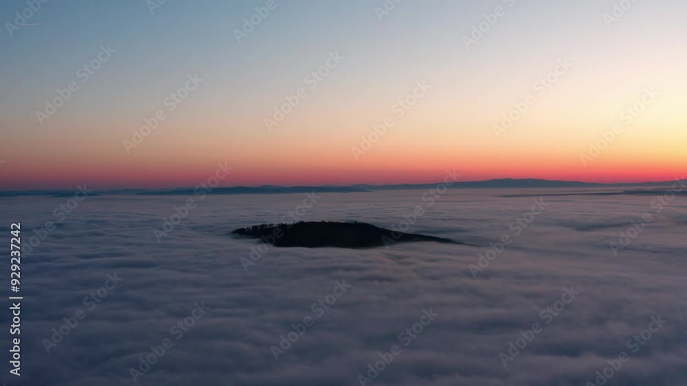 Island Peak Surrounded by Low Clouds at Sunrise Island Peak Surrounded by Low Clouds at Sunrise