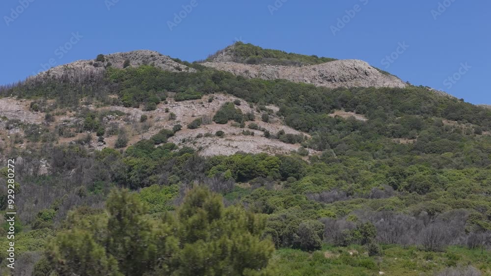 Sardinia nature. Circle pan drone shot of rough italian mountain landscape. Sardinia nature. Circle pan drone shot of rough italian mountain landscape.