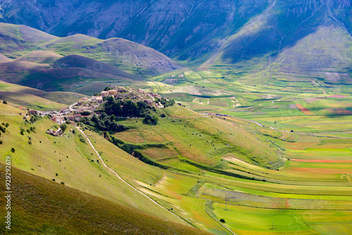 Il borgo di Castelluccio di Norcia, danneggiato seriamente dal terremoto nell'estate del 2015, sulle colline dell'altopiano denominato Pian Grande, Umbria, Italia photo