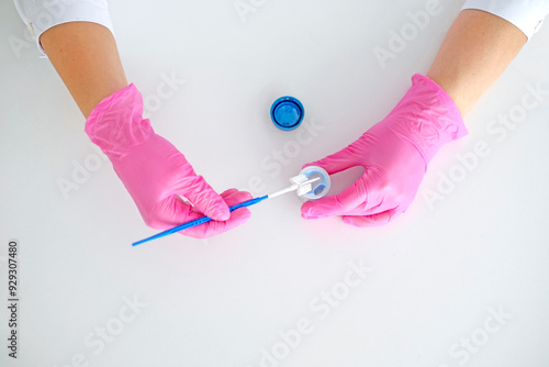 A brush for taking a swab from the cervical canal of the female  organs for examination for the presence of cancer cells