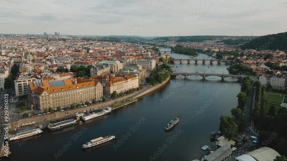 Prague city aerial view. The central part of the city, the Vltava river and many bridges over the river. Prague is the capital and largest city of Czech Republic and the historical capital of Bohemia Prague city aerial view. The central part of the city, the Vltava river and many bridges over the river. Prague is the capital and largest city of Czech Republic and the historical capital of Bohemia