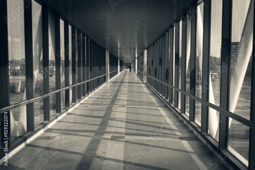 Modern Glass Corridor with Shadows