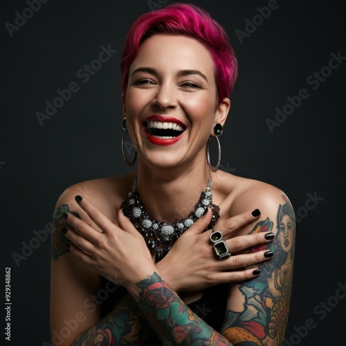 smiling woman, vibrant laughter, short pink hair, bold red lipstick, tattooed shoulders, large hoop earrings, expressive joy, dark background, studio portrait, high contrast, sharp details, elegant je photo