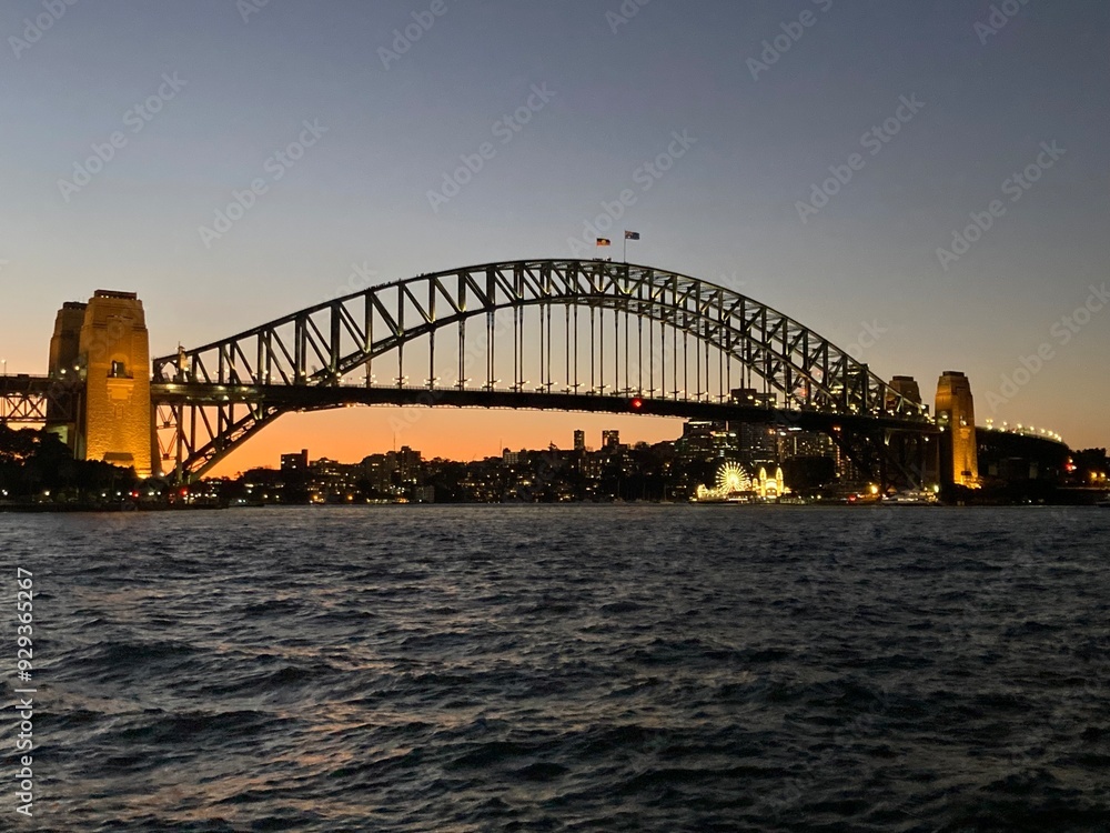 Naklejka premium Sydney harbour bridge 21 July 2024 at sunset