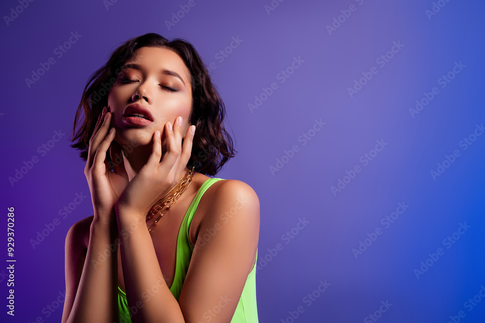 Photo of asian girl with closed eyes touch face feel tenderness isolated vivid color background Photo of asian girl with closed eyes touch face feel tenderness isolated vivid color background