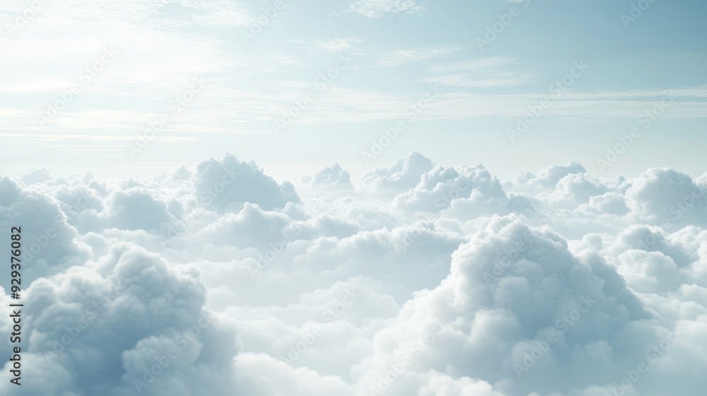Fototapeta premium A serene view of fluffy clouds in a bright sky, evoking tranquility and openness.