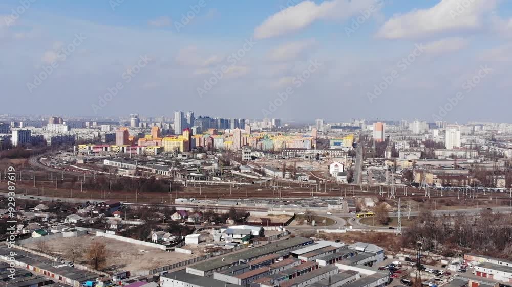 Aerial drone view from above view of Ukrainian houses. Dense residential development, architecture, residential high-rise apartment buildings, road with cars on the left bank of Kyiv, Ukraine
Aerial drone view from above view of Ukrainian houses. Dense residential development, architecture, residential high-rise apartment buildings, road with cars on the left bank of Kyiv, Ukraine
