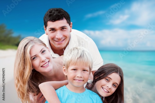 Happy family, Parents, children at vacation near sea