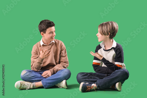 Happy brothers chatting on ...