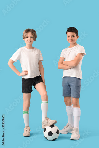 Happy brothers with soccer ...